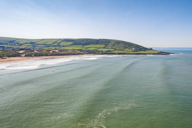Croyde beach with a view over the sea and countryside in North Devon